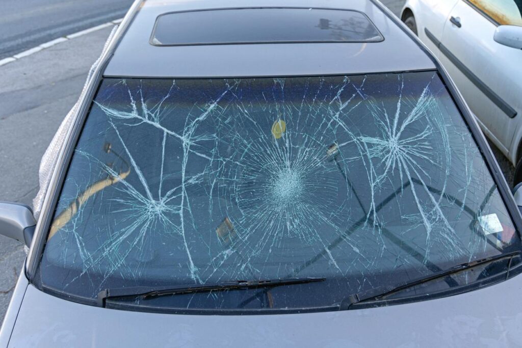A broken car windshield.